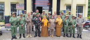 MONITORING DAN EVALUASI SATLINMAS KELURAHAN